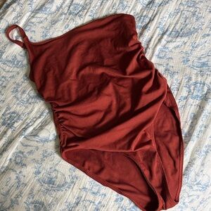 One-Shoulder Ribbed Swimsuit in Rust Red